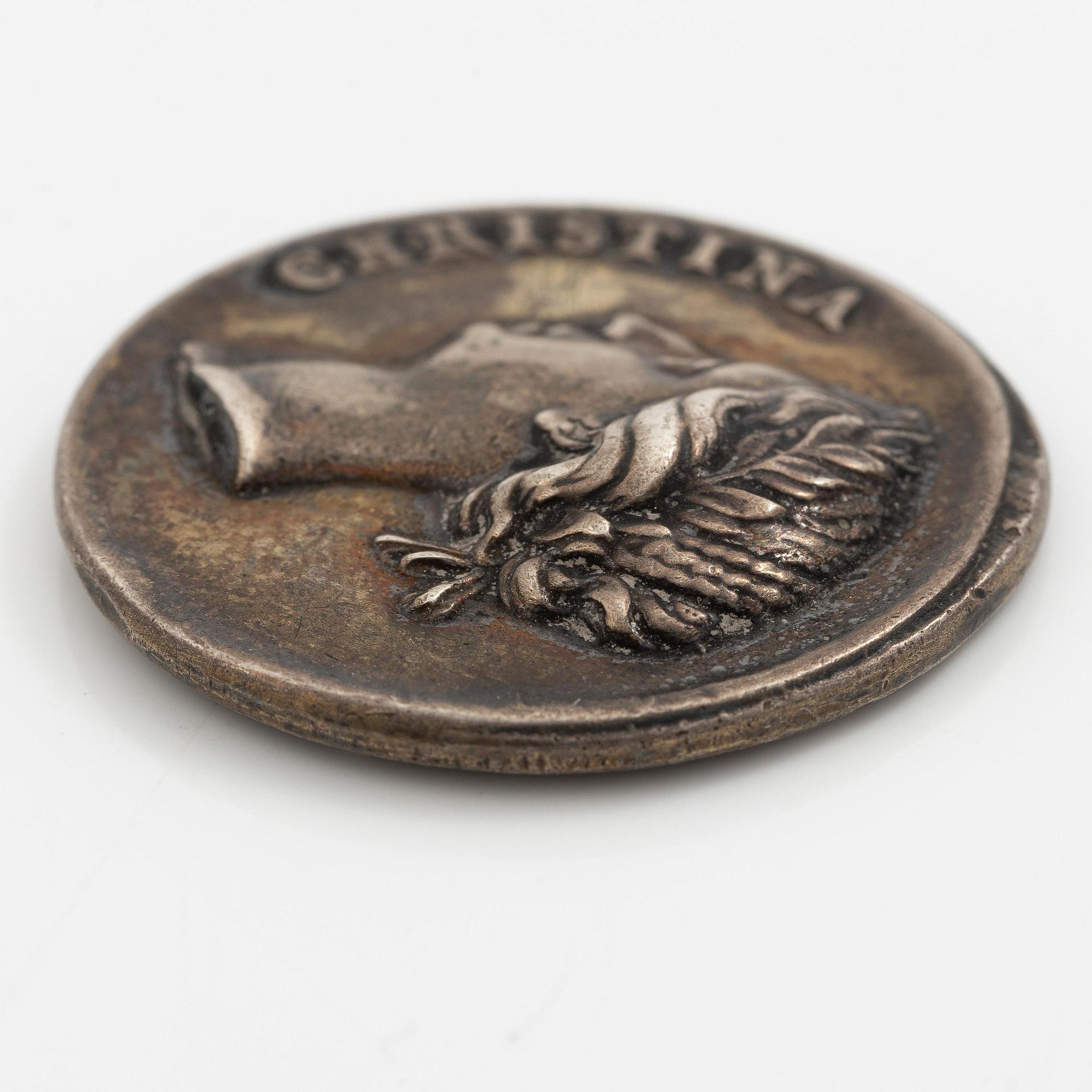 A coin commemorating Christina of Sweden's coronation 1650, by Erich Parise (medal engraver, fl. mid 17th century).