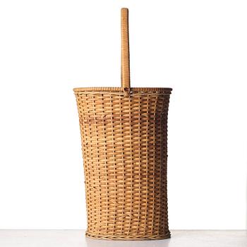 Firma Svenskt Tenn, a fretted rattan umbrella stand, mid 1900's, provenance Estrid Ericson.