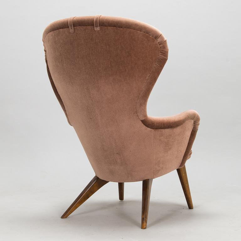 Carl Gustaf Hiort af Ornäs, a 'Siesta' armchair,  Puunveisto Oy - Träsnideri Ab, Finland 1940s-50s.