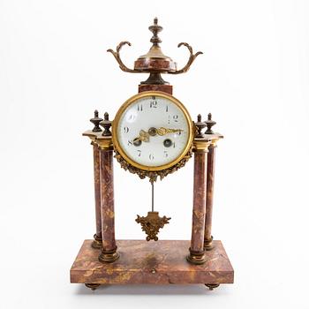 A Louis XVI style table clock first half of the 20th century.