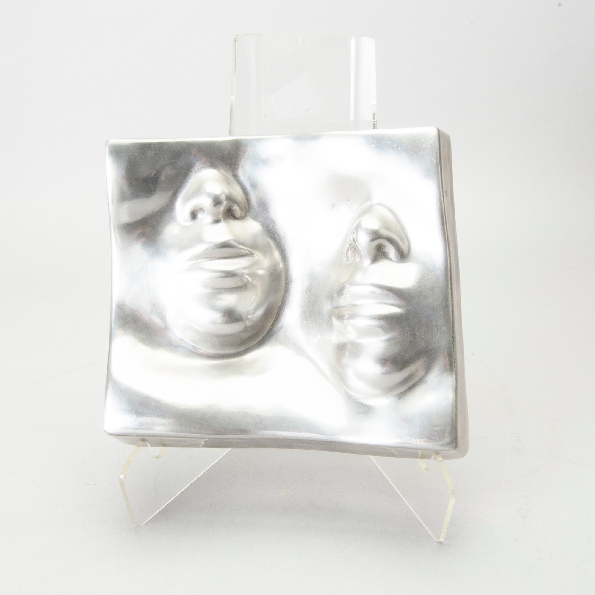 An Barbro Bäckström relief in aluminium. Signed and dated 60/75 1972.