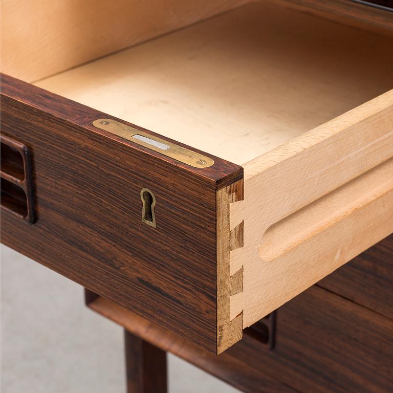 A 1960´s  Danish writing desk veneered with jakaranda, possibly designed by Arne Vodder.