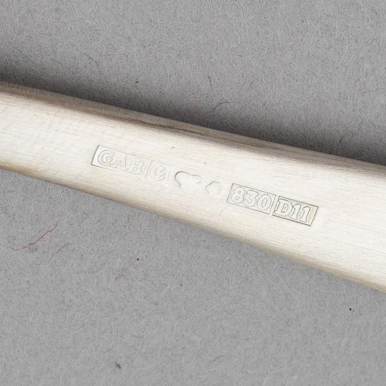 Jacob Ängman, twelve silver spoons and a silver spatula, 'Rosenholm', GAB, 2001-2002.