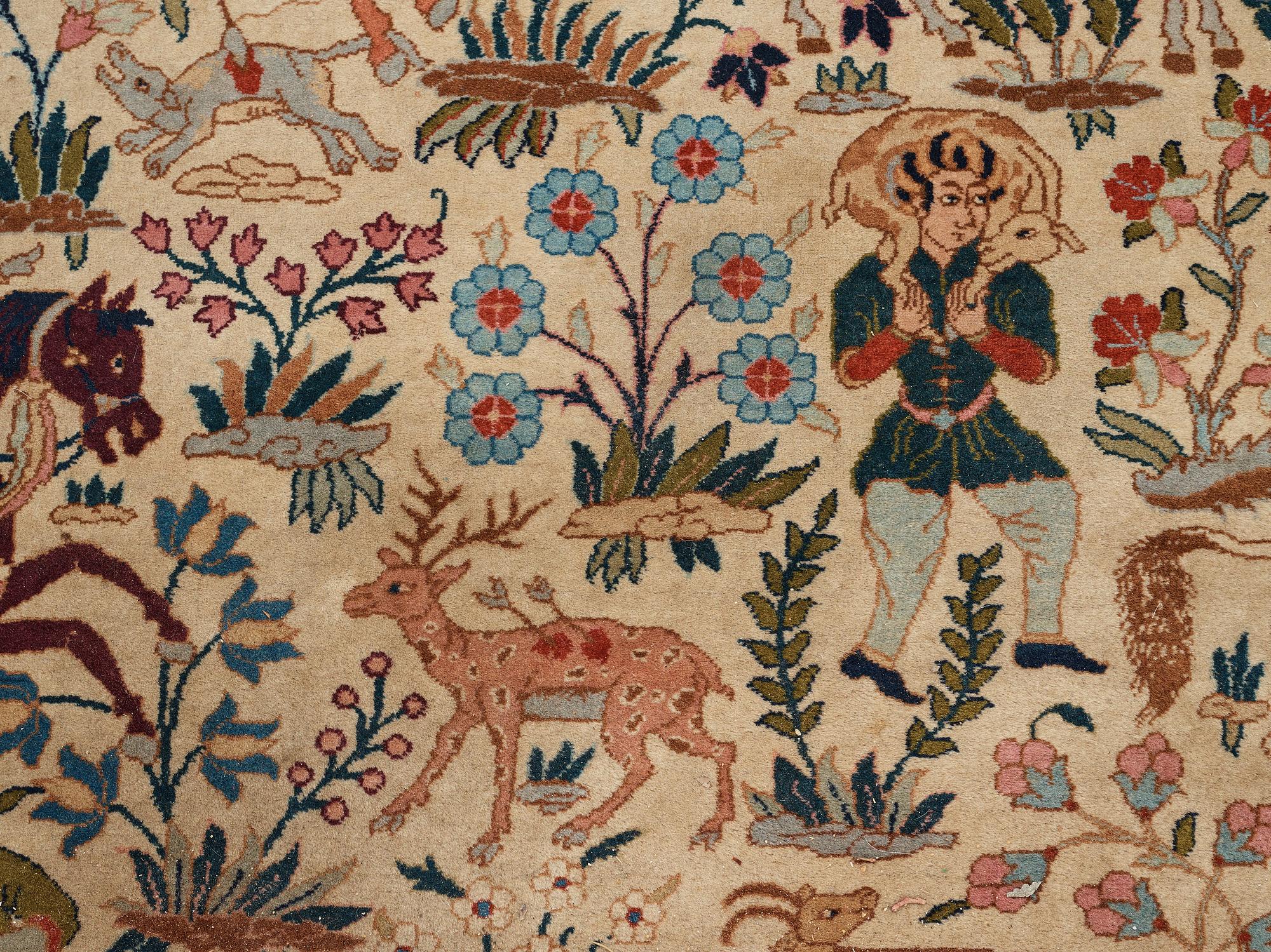 A CARPET, a semi-antique Tabriz figural, ca 327-333,5 x 236,5-240 cm.