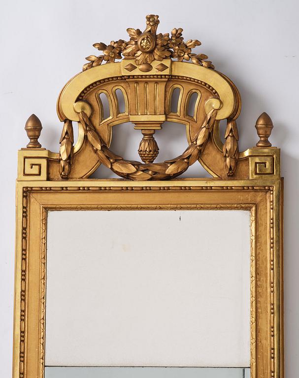 A Gustavian giltwood mirror, Stockholm, late 18th century.
