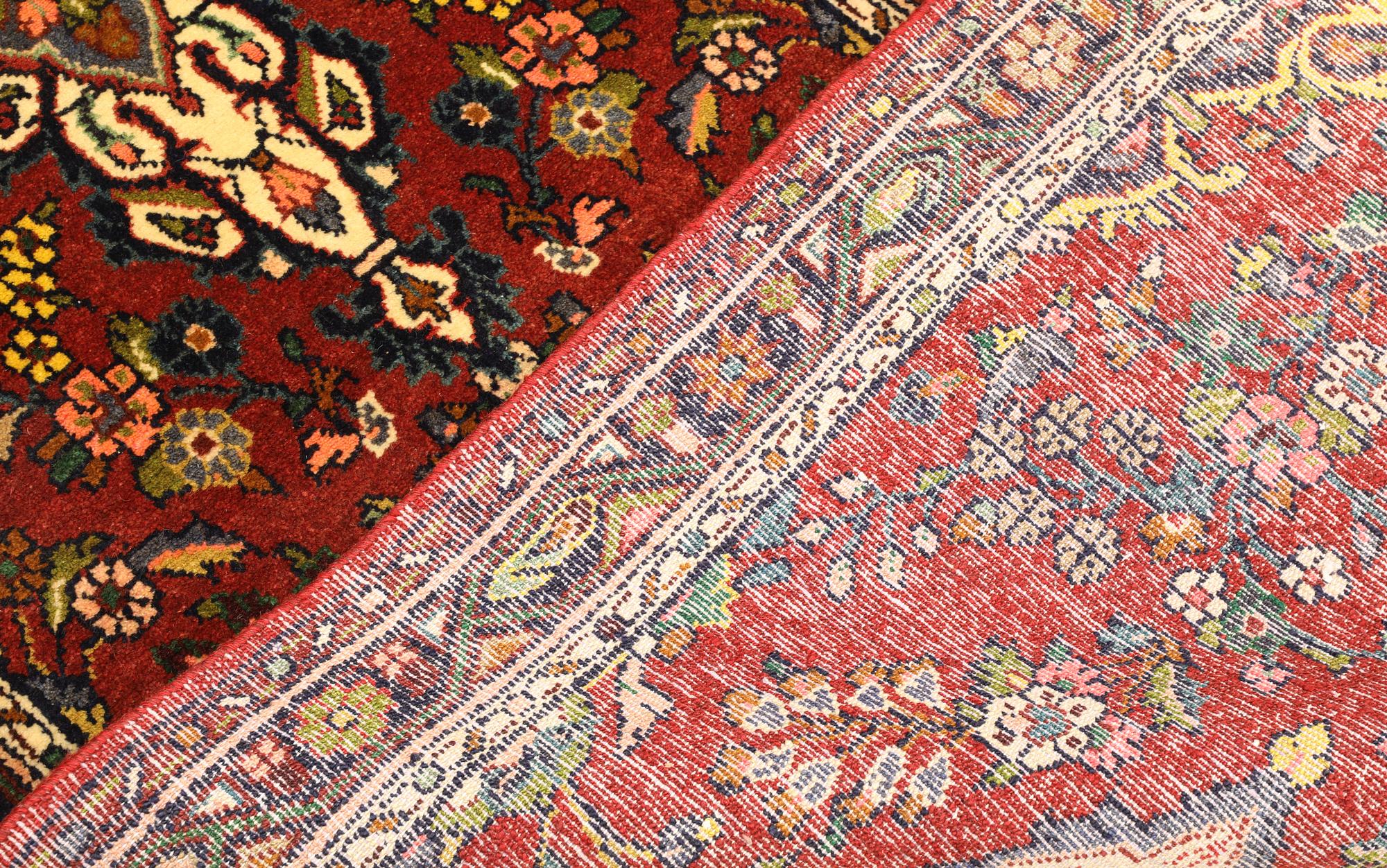 A Mehraban runner, approx. 324 x 89 cm.