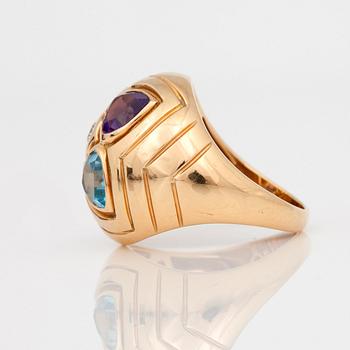 A Bulgari blue topaz, citrine, peridot, amethyst and circa 0.10 ct diamond ring.