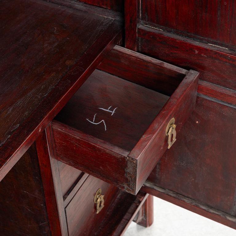 A small Chinese wooden cabinet, 1900s.