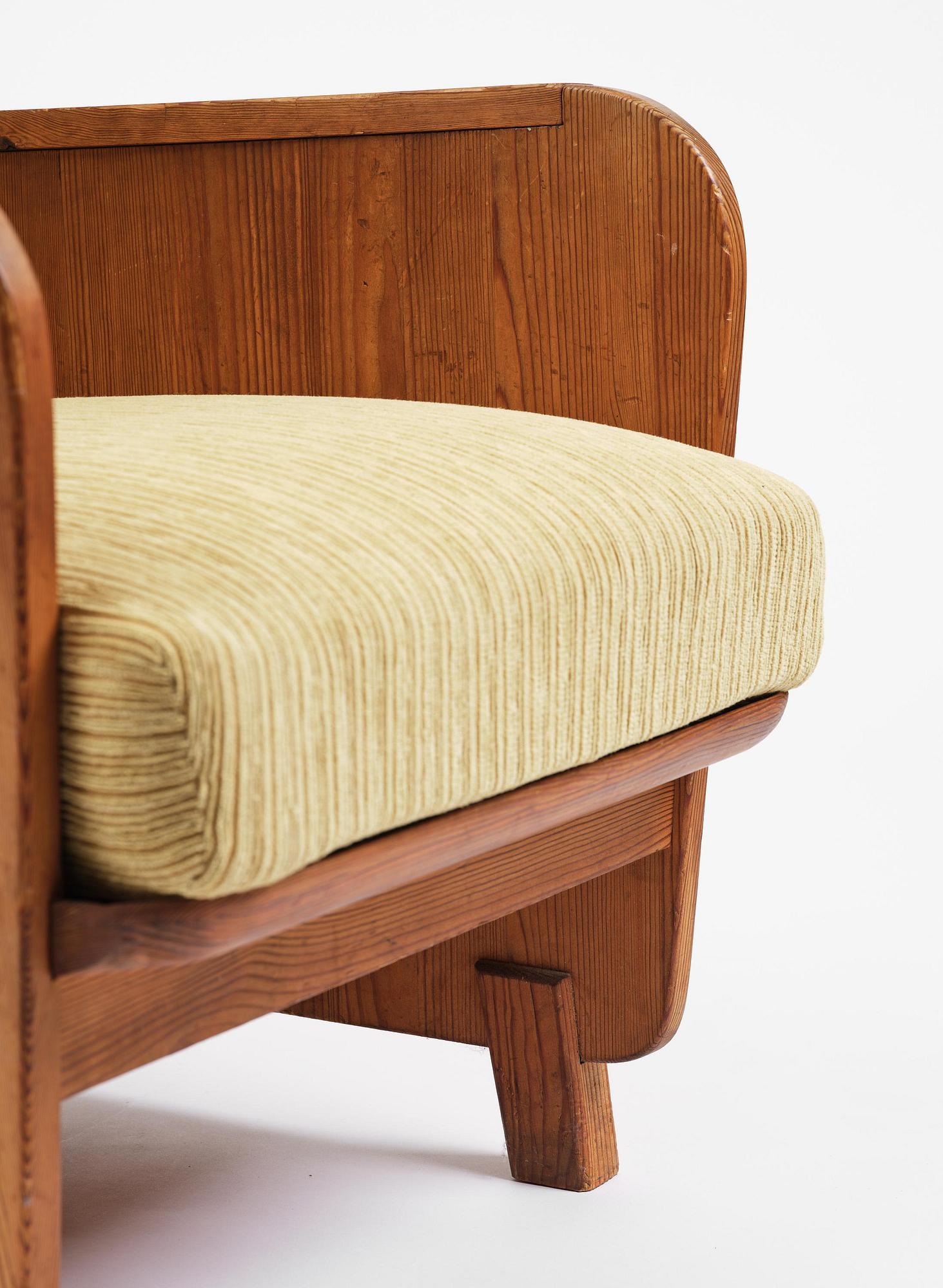Axel Einar Hjorth, a stained pine "Lovö" armchair, Nordiska Kompaniet, Sweden, 1930s.