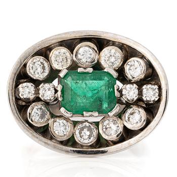Ring, 18K white gold with an emerald-cut emerald and brilliant-cut diamonds.