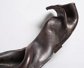 Hertha Hillfon, a black glazed stoneware wall sculpture in two parts of a face and a sky, executed in her own studio, Stockholm 1960s.