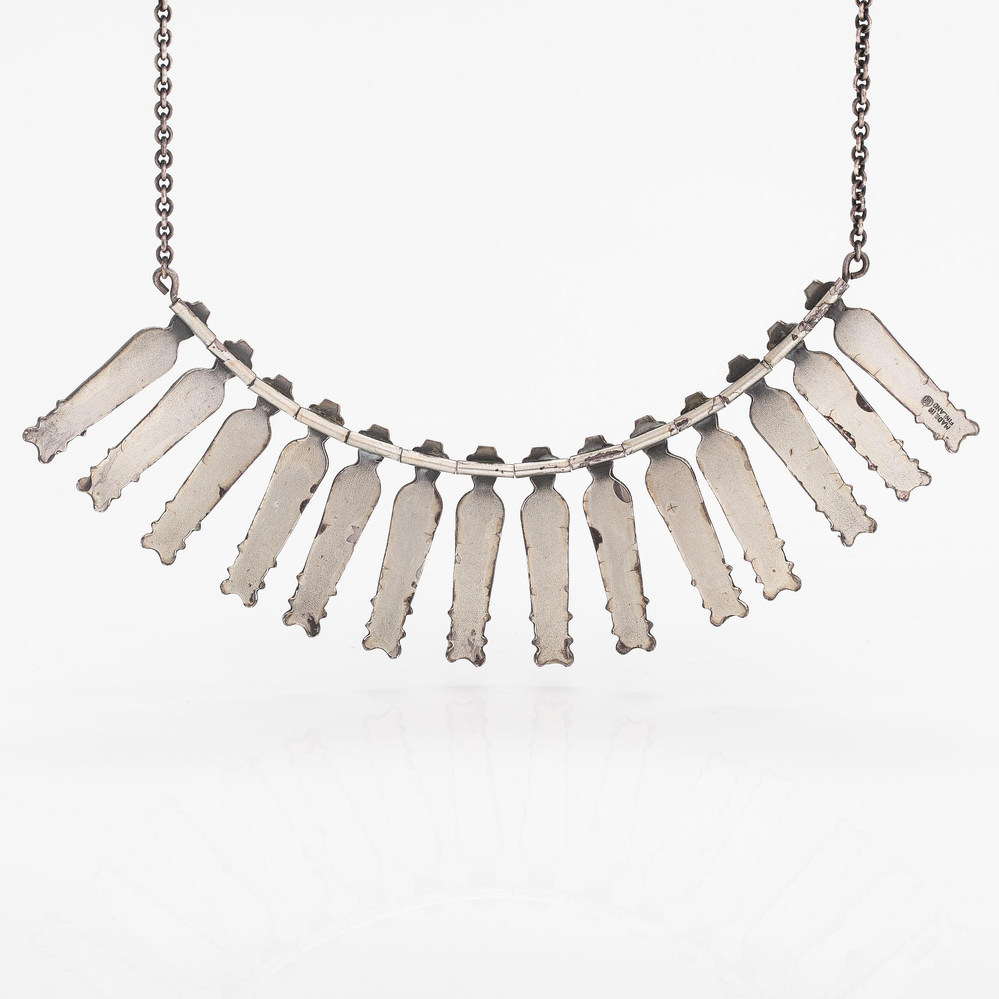 Kirsti Ilvessalo, A silver plated bronze necklace "Nukkekääty". Kalevala koru, Helsinki.