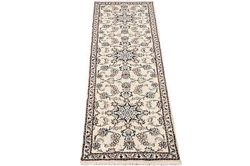 A Nain runner carpet, part silk, c. 298 x 80 cm.