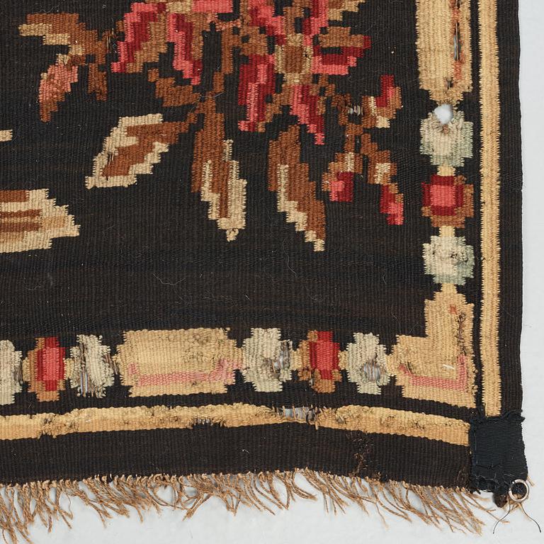 A CARPET. Antique Bessarabian Kilim. Ca 213 x 255,5 cm.