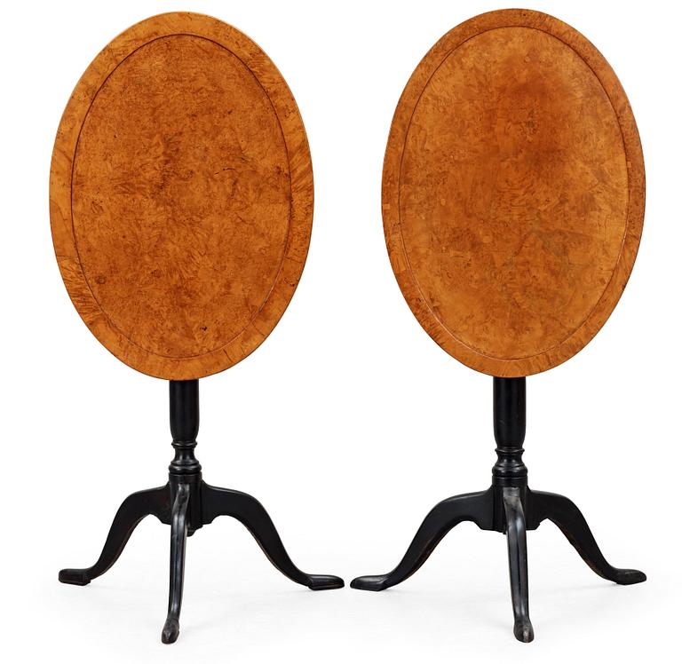 Two matched Swedish circa 1800 tilt-top tables.