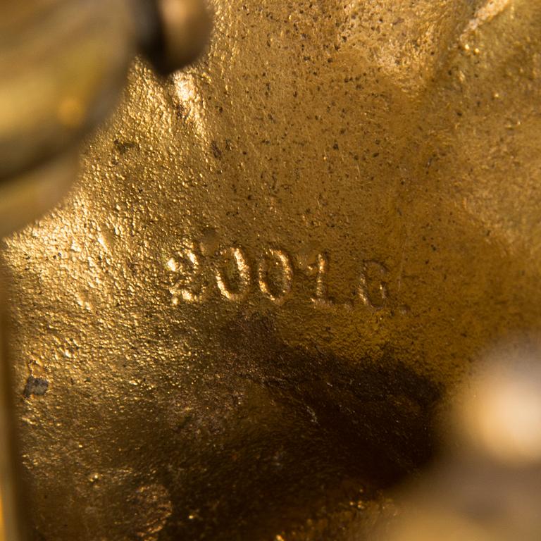 A brass chandelier with prisms, second half of the 19th century. Height 83 cm.