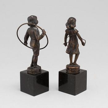 JULIUS SCHMIDT-FELLING, sculptures, a pair, bronze, signed.