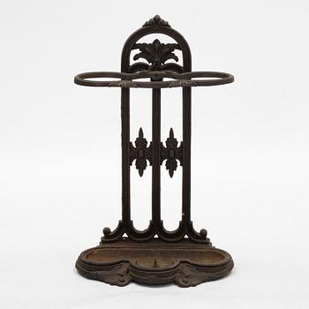 A cast iron umbrella stand, circa 1900.