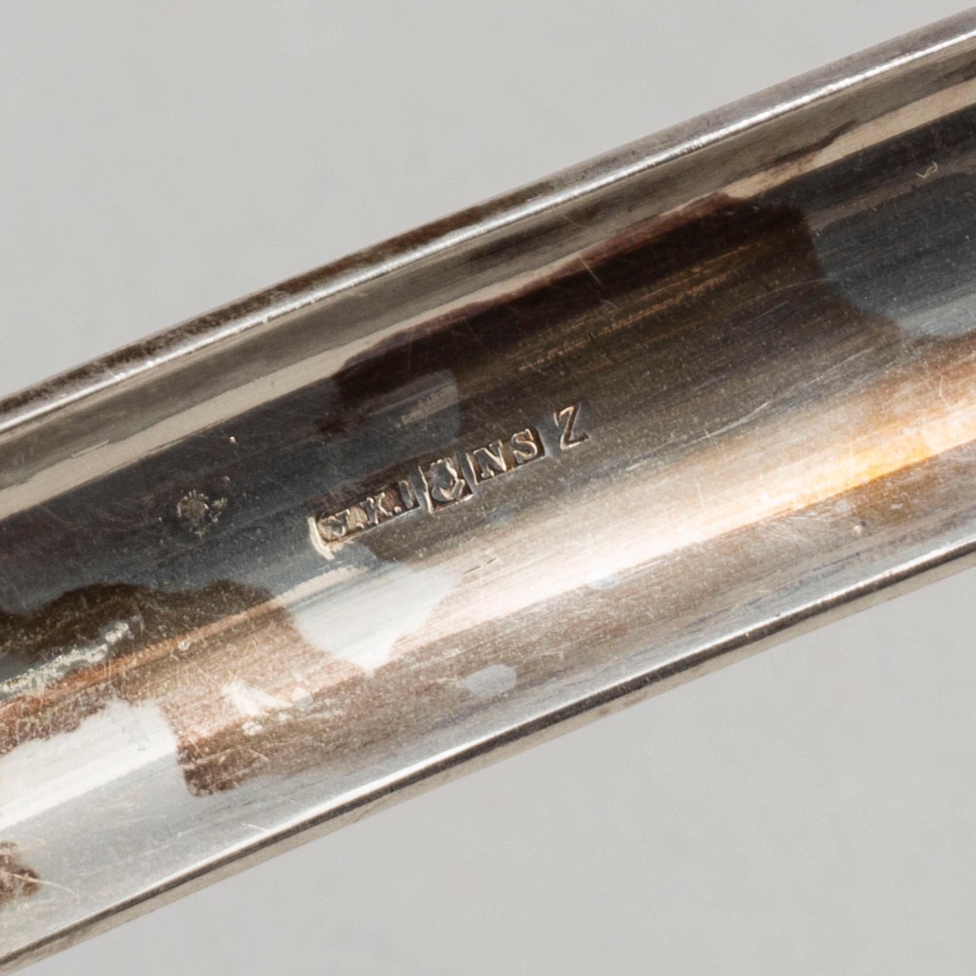 A pair of 20th century silver plated bottle holders.
