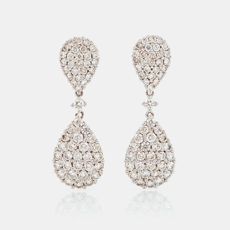 A pair of diamond, circa 1.60 cts, earrings.