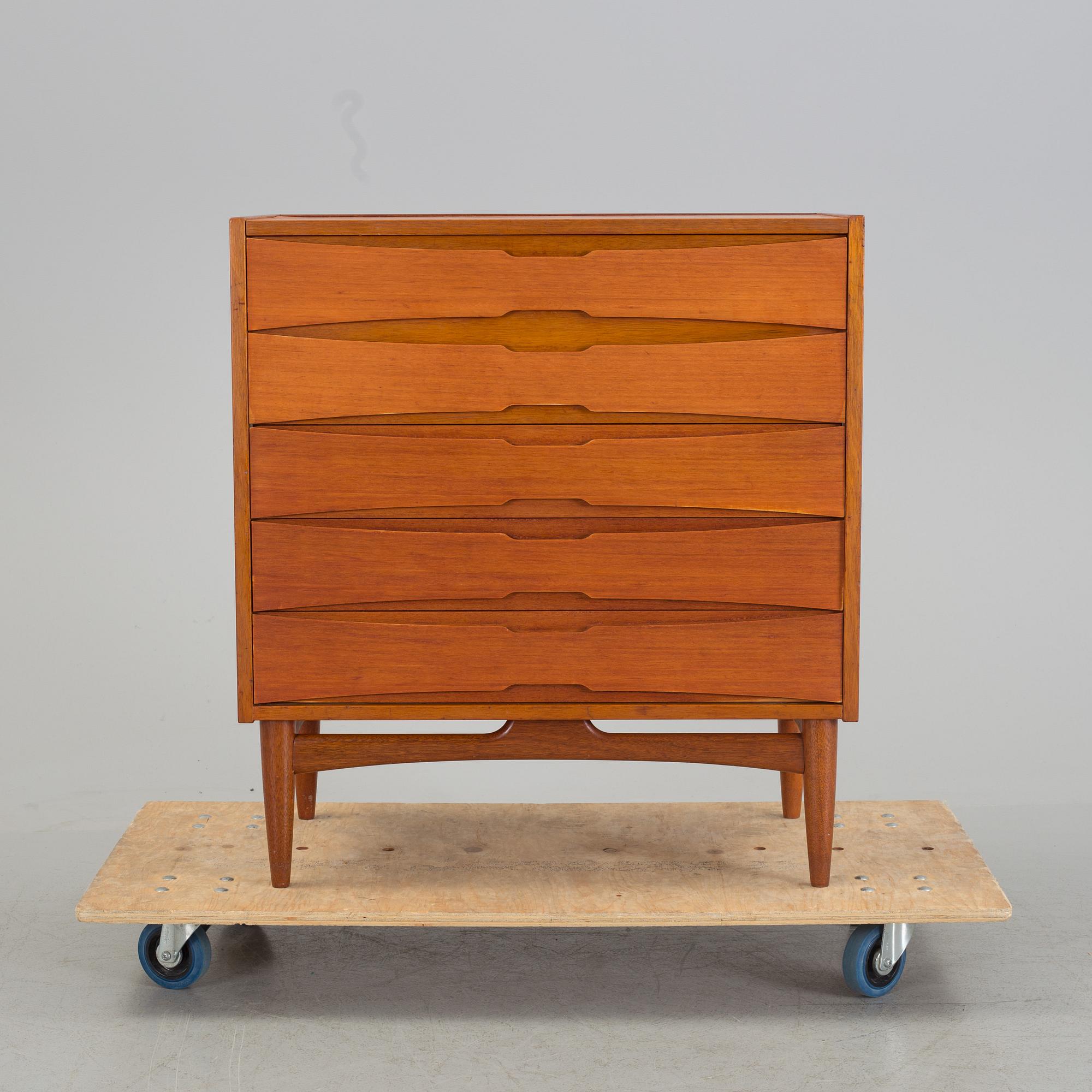 A mid 20th century teak dressing commode.