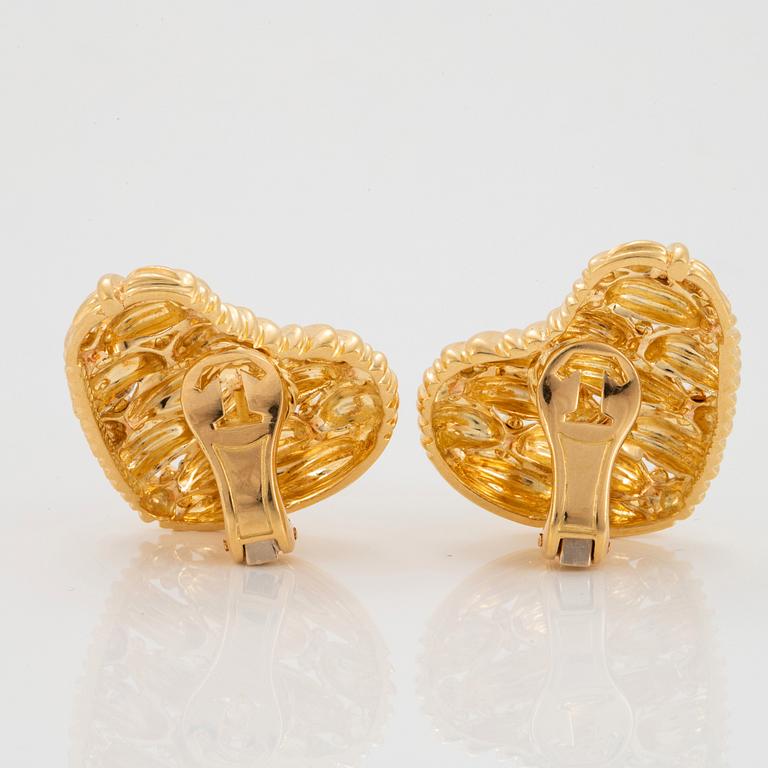 A pair of 18K gold Tiffany earrings.