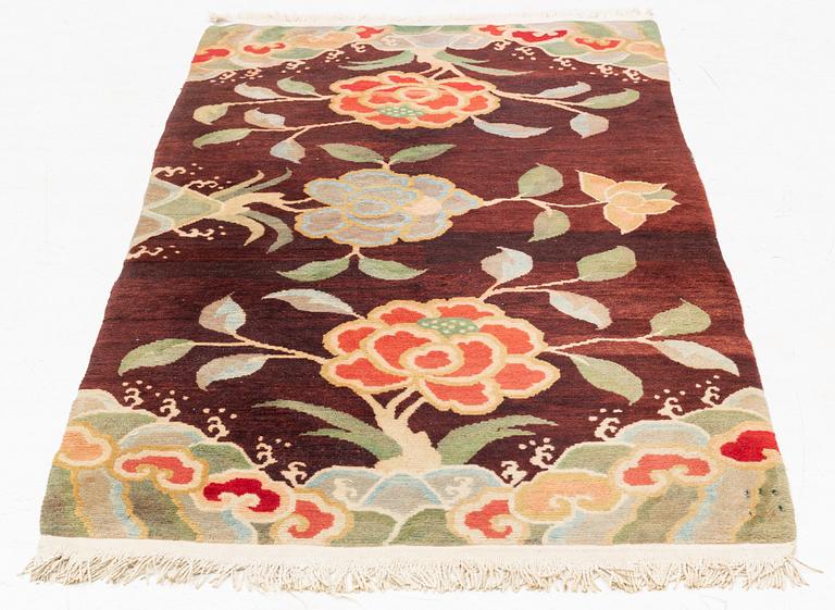 A rug, China, circa 176 x 92 cm.