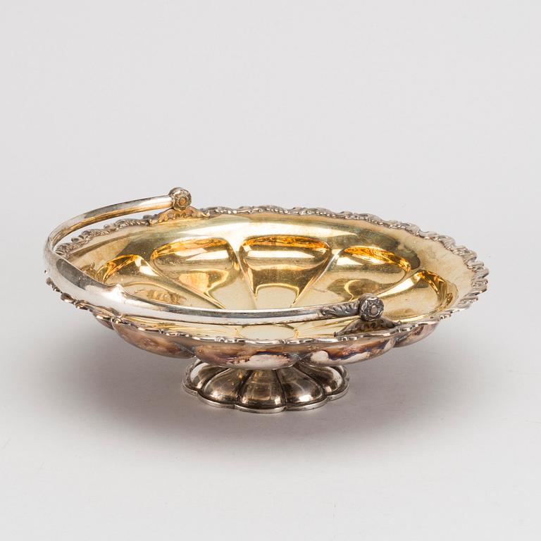 A finish silver bowl on foot with handle, 1935. Weight app. 560 gram.