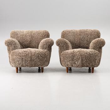 A pair of easy chairs, mid-20th century.