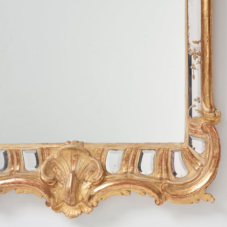 A Swedish Rococo mid 18th century rococo mirror in the manner of Ehrhart Göbel (1690-1764).