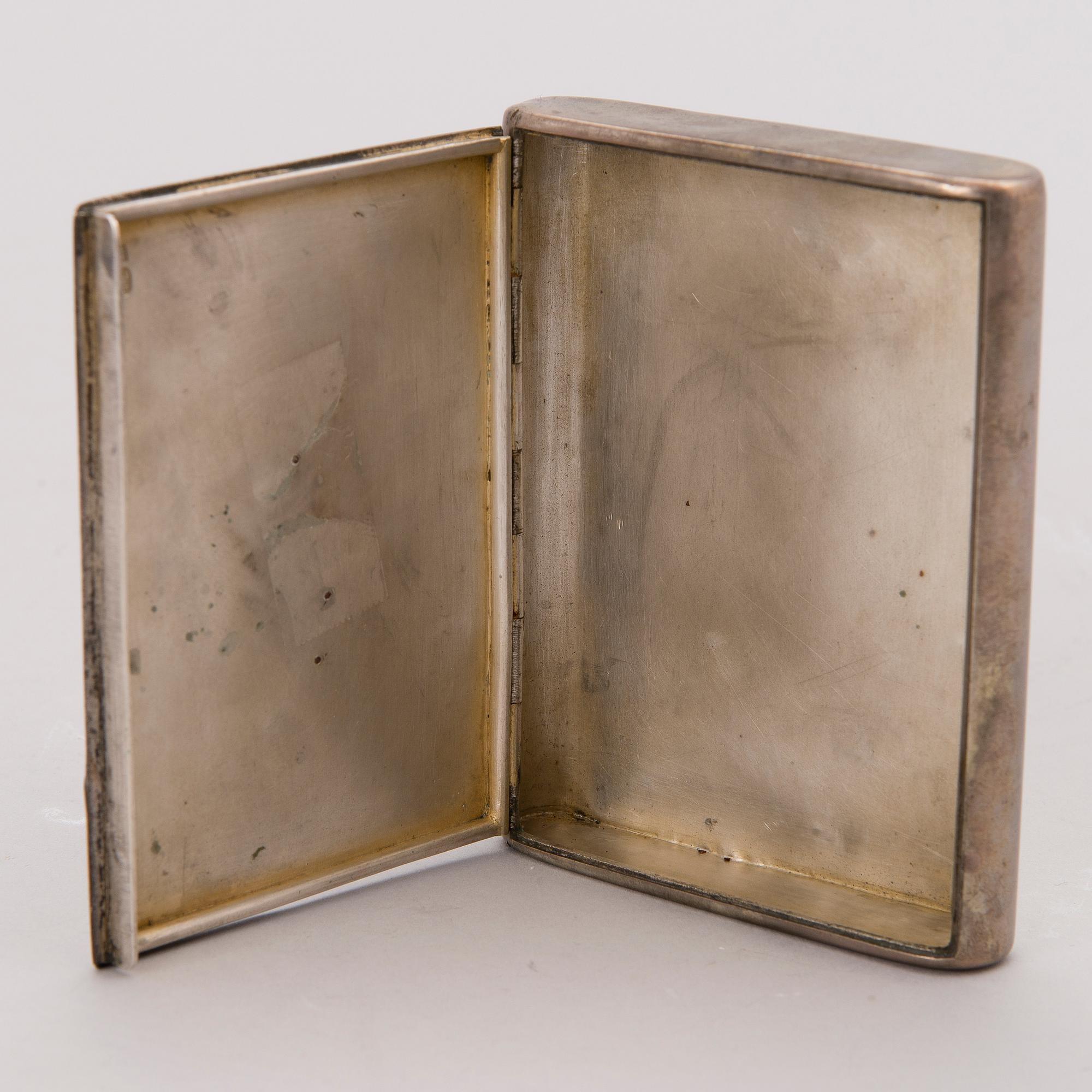 A cigarette case in silver (875) and gold, early 20th Century.