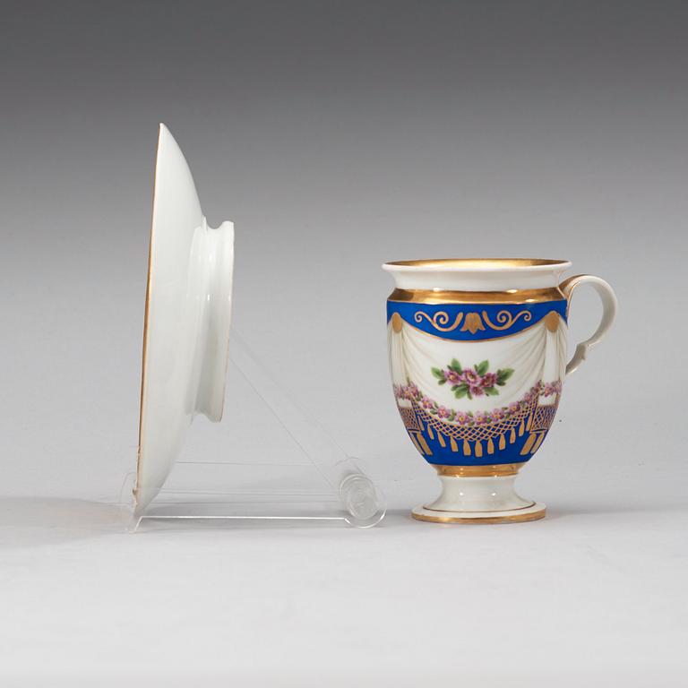 Meissen, A Meissen Empire cup with stand.
