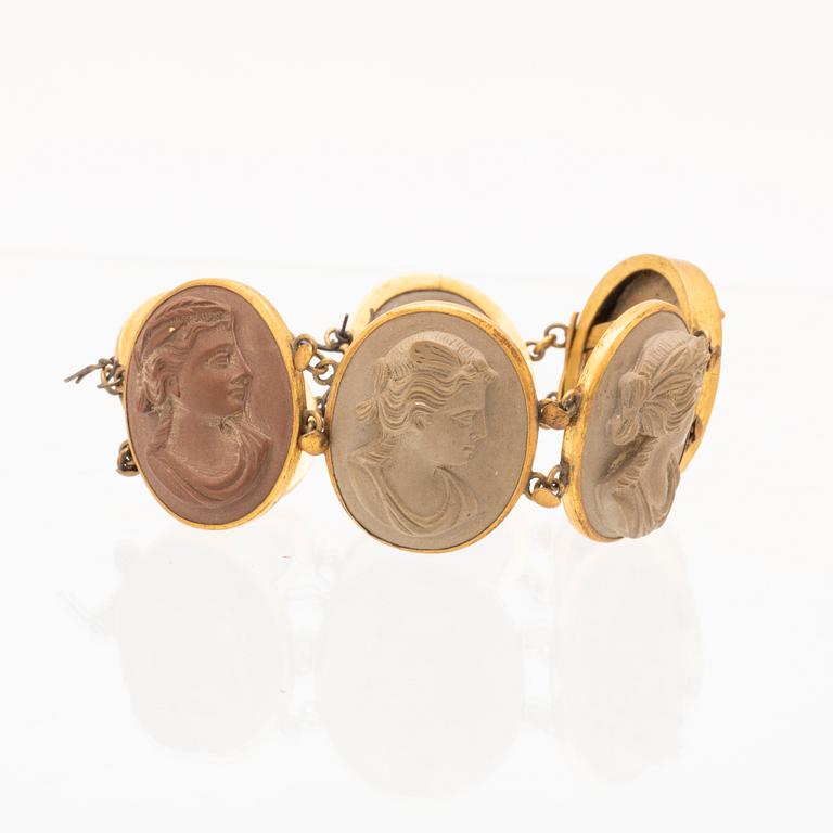 A bracelet set with lava cameos.
