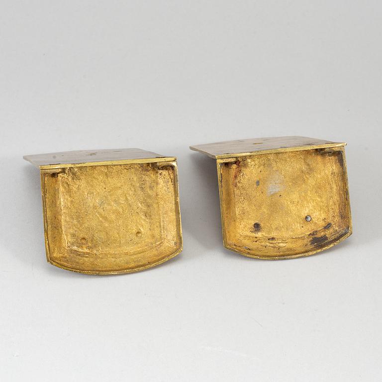 A pair of art déco bronze book ends, 1930s.