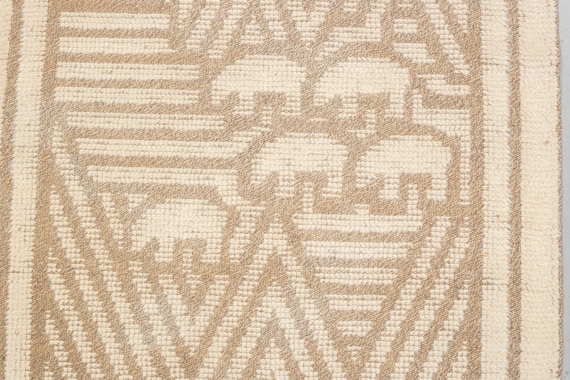matto, knotted pile in relief, ca 187,5-189,5 x 96,5-100 cm, signed and dated S.K.L.H. 1945 at the back.