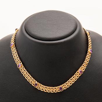 Halsband x-länk 18K guld med cabochonslipade ametister, Anetoft & Persson Stockholm 1961.