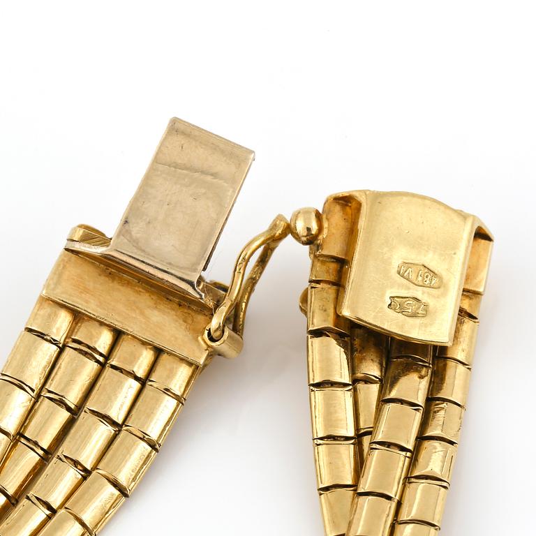 ARMBAND, guld 18K, sju små safirer, Italien 1900-talets andra hälft. Vikt ca 31 gram.