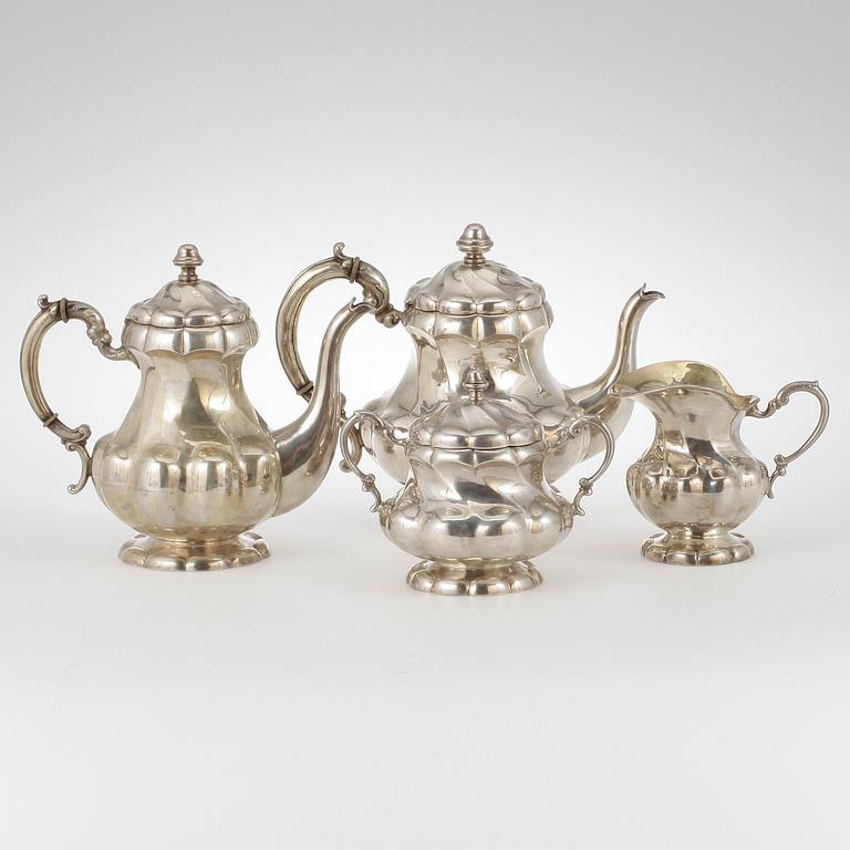 TE- samt KAFFESERVIS, 4 delar, silver, rokokostil,  USA, 1900-talets första hälft Tot vikt ca 2930 gram.