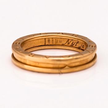 A 18K gold ring by Bvlgari.