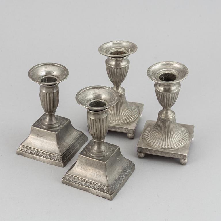 Two pairs of Swedish pewter candlesticks by Erik Wikgren, possibly and Nils Silov, first half of the 19th century.