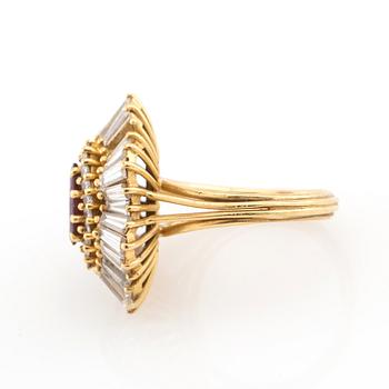 Ring in 18K gold with a marquise-cut red stone and baguette-cut diamonds.