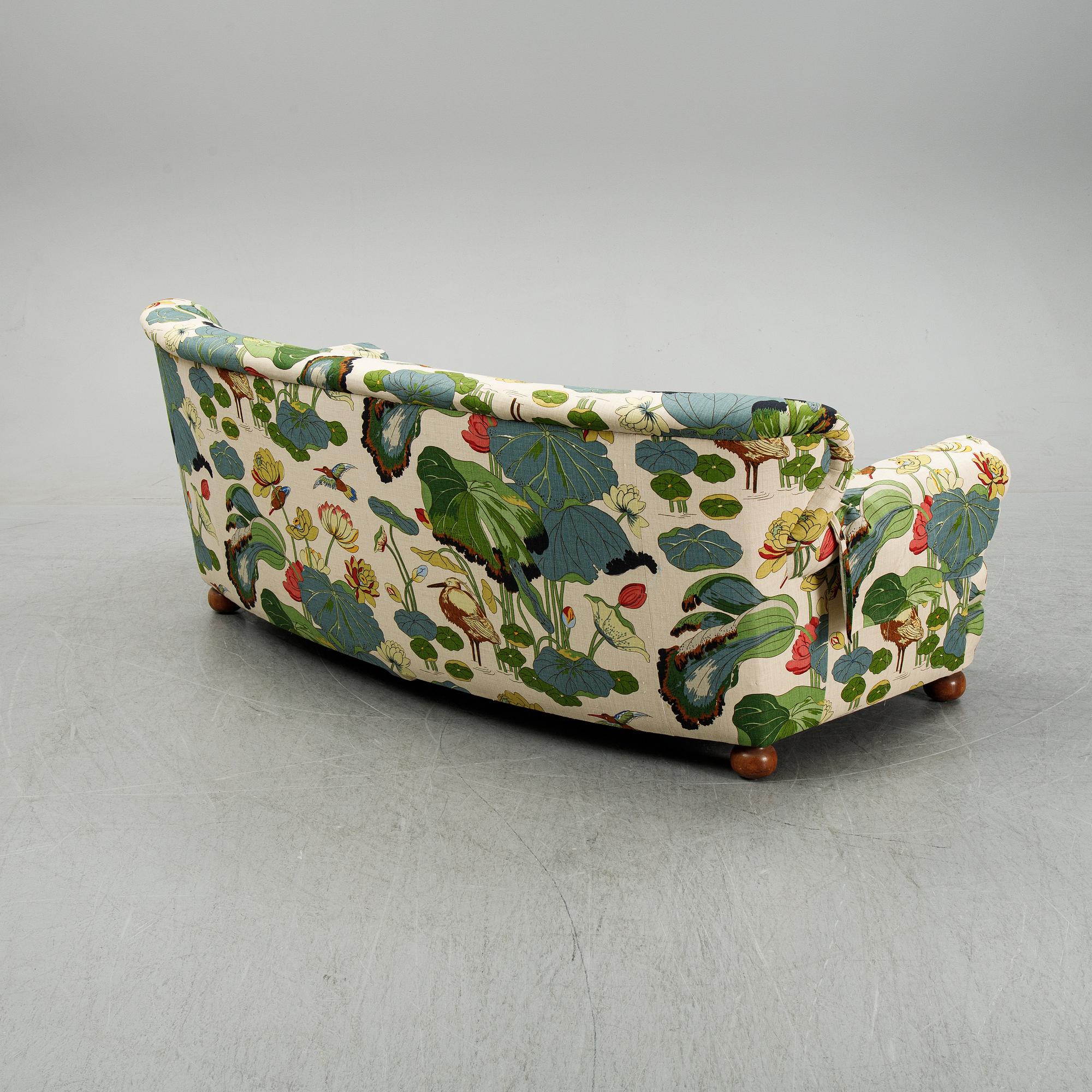 A model 968 sofa by Josef Frank for Firma Svenskt Tenn.