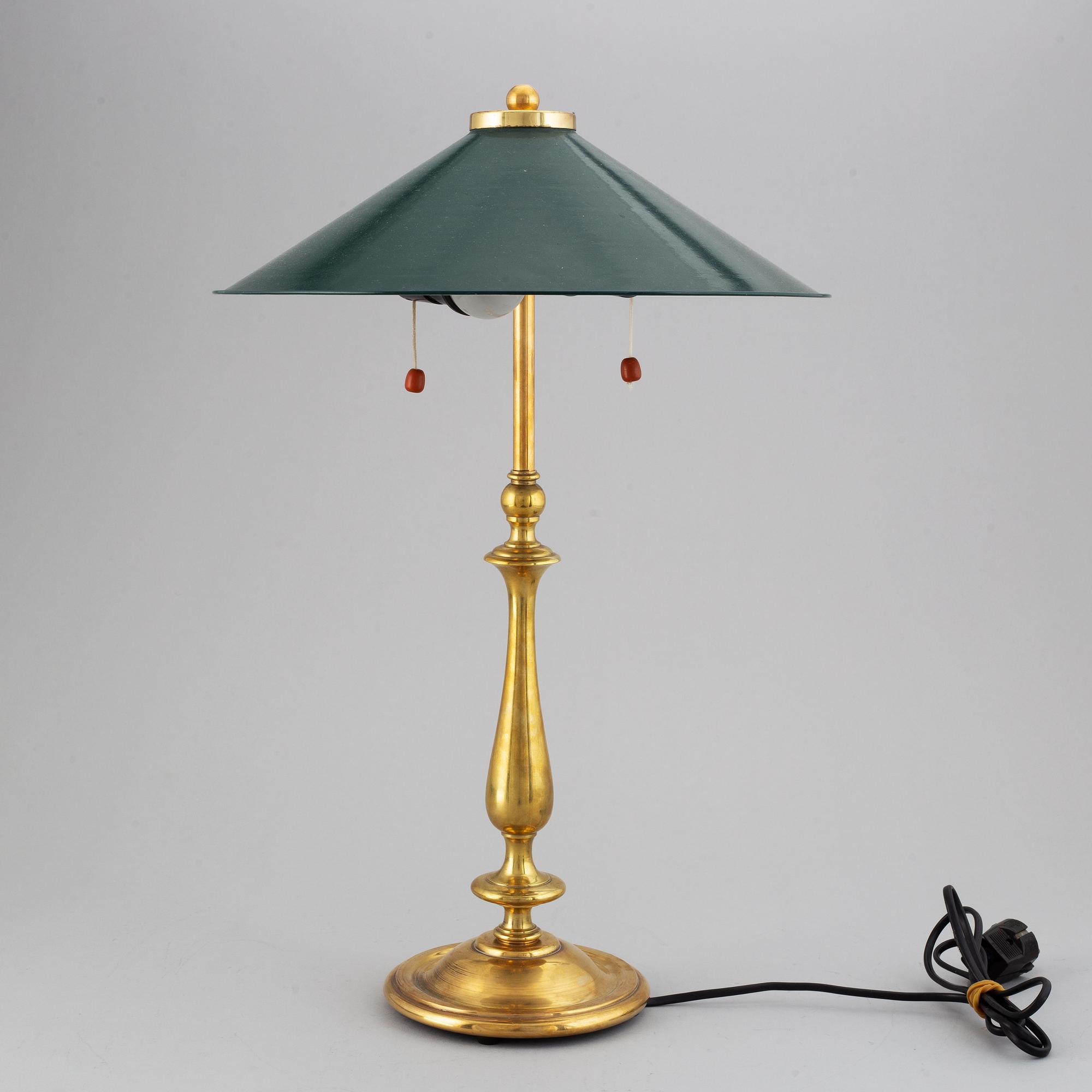 A brass table light, first half of the 20th Century.