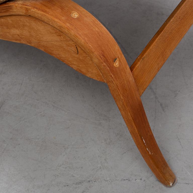 A lounge chair by Bruno Mathsson, mid 20th Century.
