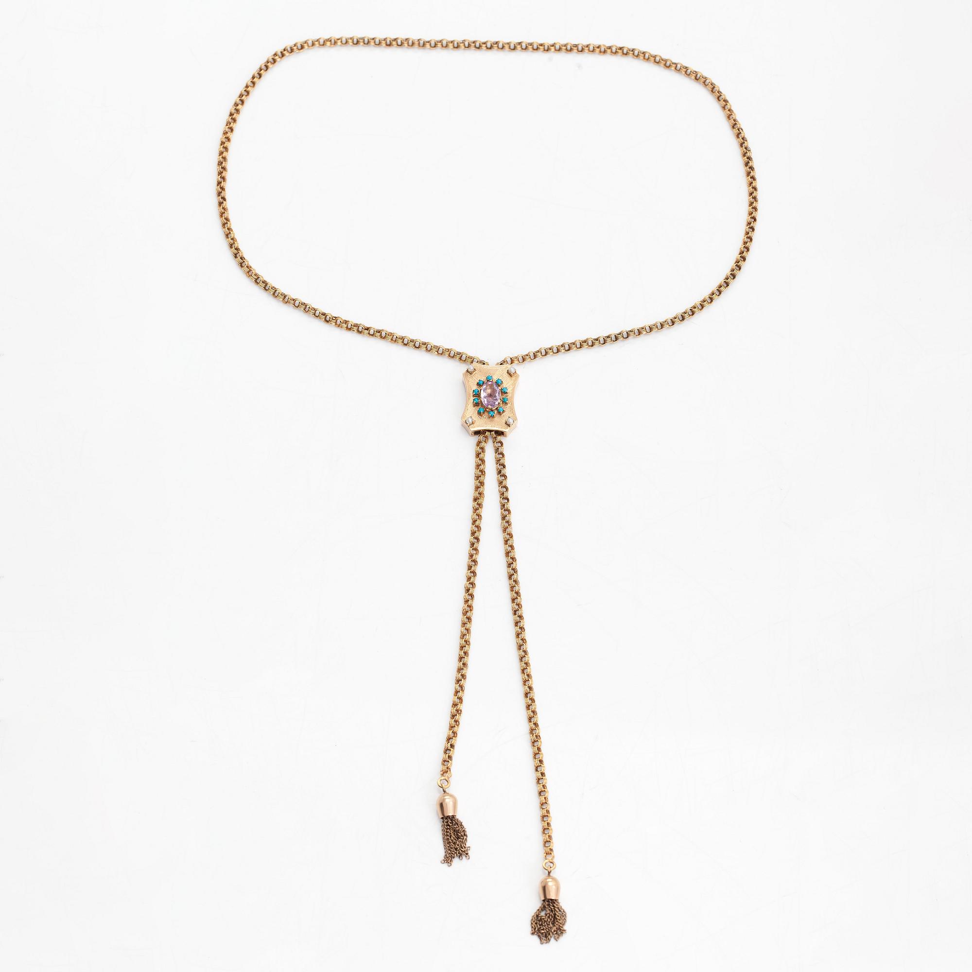 A 14K gold necklace with an amethyst, turquoises and seed pearls. Foreign marks.