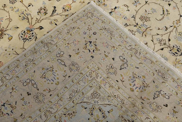 A Keshan carpet, 405 x 304 cm.