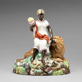 A Royal Copenhagen allegorical figure group of Africa, Denmark, early 20th Century.