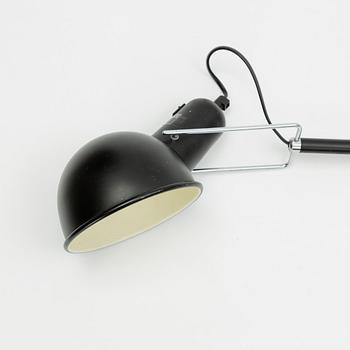 Paolo Rizzatto, a model 265 wall lamp, Flos, Italy.