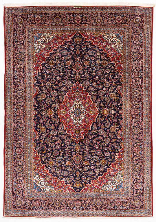 A Kashan carpet signed, approx. 420 x 292 cm.