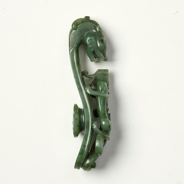 A nephrite belt hook, China, early 20th Century or older.